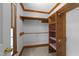 Walk-in closet features built-in shelves and ample storage space at 221 Jansmith Ln, Raleigh, NC 27615