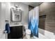 Bathroom featuring a shower with stylish blue and white tree-themed curtain at 2220 Inwood Landing Ct, Raleigh, NC 27603
