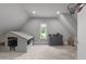 Attic bonus room with a unique playhouse and natural light at 2220 Inwood Landing Ct, Raleigh, NC 27603