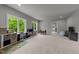 Spacious bonus room with neutral paint, plush carpet, and natural light at 2220 Inwood Landing Ct, Raleigh, NC 27603