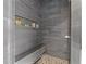 Walk-in shower with built-in bench and a tiled shampoo niche at 2220 Inwood Landing Ct, Raleigh, NC 27603