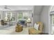Bright bonus room featuring neutral walls, a ceiling fan, and large windows offering ample natural light at 2325 Old Oak Pl, Hillsborough, NC 27278