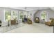Bright bonus room featuring neutral walls, a ceiling fan, and large windows offering ample natural light at 2325 Old Oak Pl, Hillsborough, NC 27278