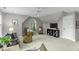 Bright bonus room featuring neutral walls, a ceiling fan, and large windows offering ample natural light at 2325 Old Oak Pl, Hillsborough, NC 27278