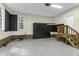 Spacious two car garage featuring an epoxy floor, storage solutions and work area at 2325 Old Oak Pl, Hillsborough, NC 27278