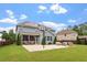 This home's backyard features a basketball hoop, solar panels, patio, and screened in porch at 2333 Lantern Walk Ln, Wake Forest, NC 27587