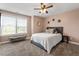 Bedroom featuring natural light, neutral decor, and a ceiling fan at 2333 Lantern Walk Ln, Wake Forest, NC 27587