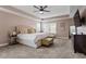 Relaxing main bedroom featuring a king size bed, tray ceilings and soft decor at 2333 Lantern Walk Ln, Wake Forest, NC 27587
