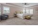 Spacious primary bedroom with tray ceiling, soft tones, and lots of natural light at 2333 Lantern Walk Ln, Wake Forest, NC 27587