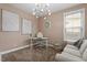Modern home office with contemporary lighting and decor, offering a stylish workspace at 2333 Lantern Walk Ln, Wake Forest, NC 27587