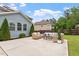 Relax on the patio featuring cozy wicker furniture and view of the landscaped yard at 2333 Lantern Walk Ln, Wake Forest, NC 27587