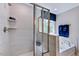 Elegant bathroom with shower, tub, and neutral tile at 2512 Stonington Dr, Cary, NC 27523
