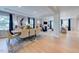 Spacious dining room with hardwood floors, neutral paint, stylish furniture, and open layout at 2512 Stonington Dr, Cary, NC 27523
