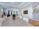 Bright dining room featuring a large table with seating for eight and an open floor plan at 2512 Stonington Dr, Cary, NC 27523