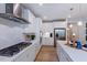 New kitchen with stainless appliances, stone countertops, and recessed lighting at 2512 Stonington Dr, Cary, NC 27523