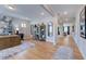 Bright living room with hardwood floors, natural light, neutral paint, stylish furniture, and open layout at 2512 Stonington Dr, Cary, NC 27523