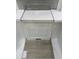 Sample of white cabinet with white countertop and wood-look flooring at 252 Meadowbark Bnd # 46, Garner, NC 27529