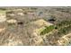 Expansive aerial view showcasing the property's acreage, ponds, and wooded surroundings at 2778 Morton-Pulliam Rd, Roxboro, NC 27574