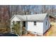 Charming single-story home with white siding, a grey roof, and cozy porch at 2778 Morton-Pulliam Rd, Roxboro, NC 27574