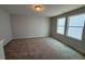 Bedroom with carpet, bright windows offering natural light and space at 285 Gregory Village Dr, Lillington, NC 27546