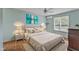 Comfortable bedroom with neutral color palette, soft lighting, and stylish decor at 308 Deep Creek Dr, Clayton, NC 27520