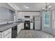 Well-lit kitchen featuring modern appliances, and a decorative backsplash at 308 Deep Creek Dr, Clayton, NC 27520