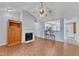 Open floor plan showcasing the living room, fireplace, and a view into the kitchen at 308 Deep Creek Dr, Clayton, NC 27520