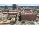 Quaint aerial view of the property set among lush greenery and serene residential streets at 311 N Gregson St, Durham, NC 27701