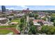 Breathtaking aerial perspective showing the property surrounded by a tree-lined street and cityscape at 311 N Gregson St, Durham, NC 27701