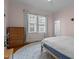 Bright bedroom with hardwood floors, a neutral color palette, and natural light at 311 N Gregson St, Durham, NC 27701