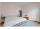 Spacious bedroom featuring hardwood floors, an area rug, and light colored walls at 311 N Gregson St, Durham, NC 27701