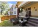 An eye catching porch with brick columns and stairs, and a fenced in garden at 311 N Gregson St, Durham, NC 27701
