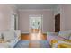 View from the living room of a home featuring hardwood floors and an adjacent dining room at 311 N Gregson St, Durham, NC 27701