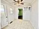 Eat-in kitchen dining area has a ceiling fan and a doorway to another room at 322 S Dixon Ave, Cary, NC 27511