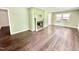 Spacious living room featuring a fireplace and hardwood floors at 322 S Dixon Ave, Cary, NC 27511