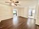 Living room with hardwood floors and view into adjacent rooms at 322 S Dixon Ave, Cary, NC 27511