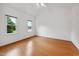 Spacious bedroom featuring wood floors, natural light, and neutral paint at 3405 E Jameson Rd, Raleigh, NC 27604
