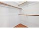 Walk-in closet with wood floor at 3405 E Jameson Rd, Raleigh, NC 27604