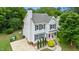 Charming two-story home boasts classic design with a well-manicured lawn and inviting curb appeal at 3405 E Jameson Rd, Raleigh, NC 27604