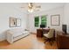 Functional home office space with a desk, comfortable seating, and plenty of natural light at 3405 E Jameson Rd, Raleigh, NC 27604