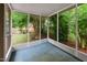Screened-in porch with view of backyard landscaping at 3405 E Jameson Rd, Raleigh, NC 27604