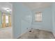 Tranquil bedroom with cool blue walls, soft carpet, and a bright window offering natural light at 345 Henderson St, Oxford, NC 27565