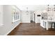 Empty Dining Area with hardwood floors and natural light offers a great space for meals at 390 Lake Magnolia Way, Smithfield, NC 27577