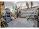 Spacious garage with storage, organization, and an overhead door system at 390 Lake Magnolia Way, Smithfield, NC 27577