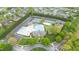 Community aerial view showcasing pool, clubhouse, tennis courts, playground and parking at 4110 Argyle Trl, Burlington, NC 27215
