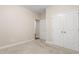 Neutral bedroom featuring carpet, double door closet, and trim at 4110 Argyle Trl, Burlington, NC 27215