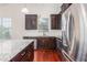 A modern kitchen featuring granite countertops and stainless steel appliances at 4110 Argyle Trl, Burlington, NC 27215