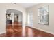 Open-concept area with access to the kitchen and a door leading to the outside at 4110 Argyle Trl, Burlington, NC 27215