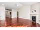 Spacious living room with high ceilings, hardwood floors and a cozy fireplace at 4110 Argyle Trl, Burlington, NC 27215
