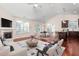 Spacious living room with hardwood floors, fireplace, and an open concept layout at 4110 Argyle Trl, Burlington, NC 27215